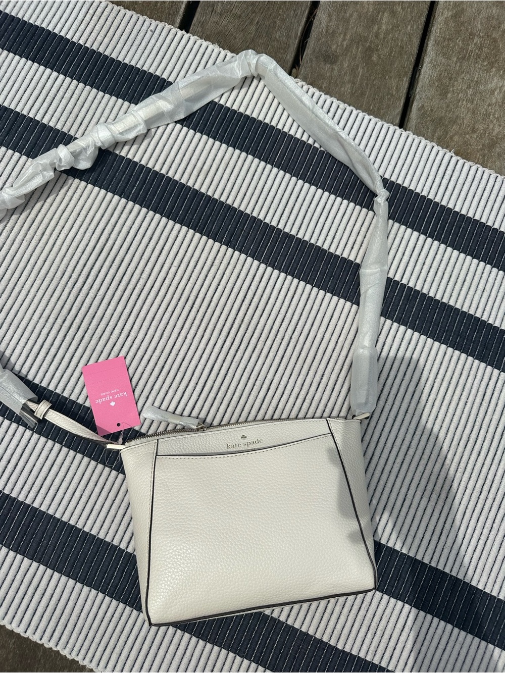 kate spade Cream Pebbled Leather Crossbody with Black Trim